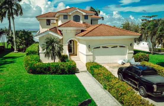 front of the Stunning 2-story waterfront villa