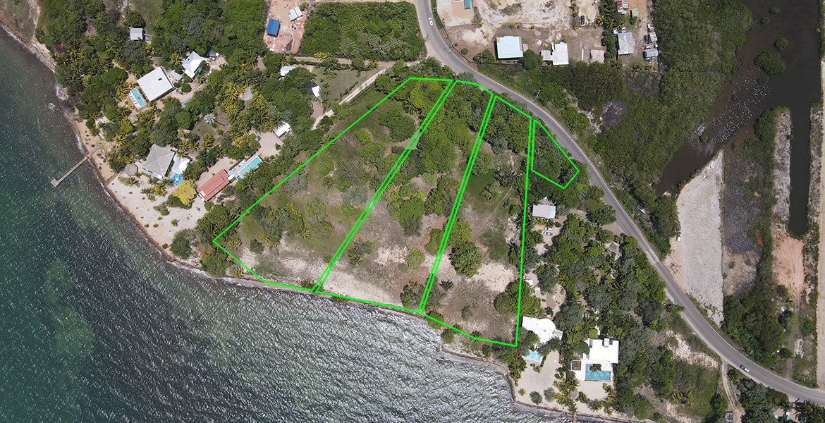 Aerial view of three large beachfront parcels in Belize