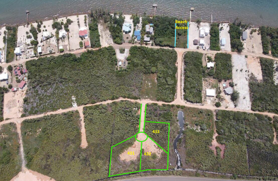 Three beach access lots in Caribbean Way for sale