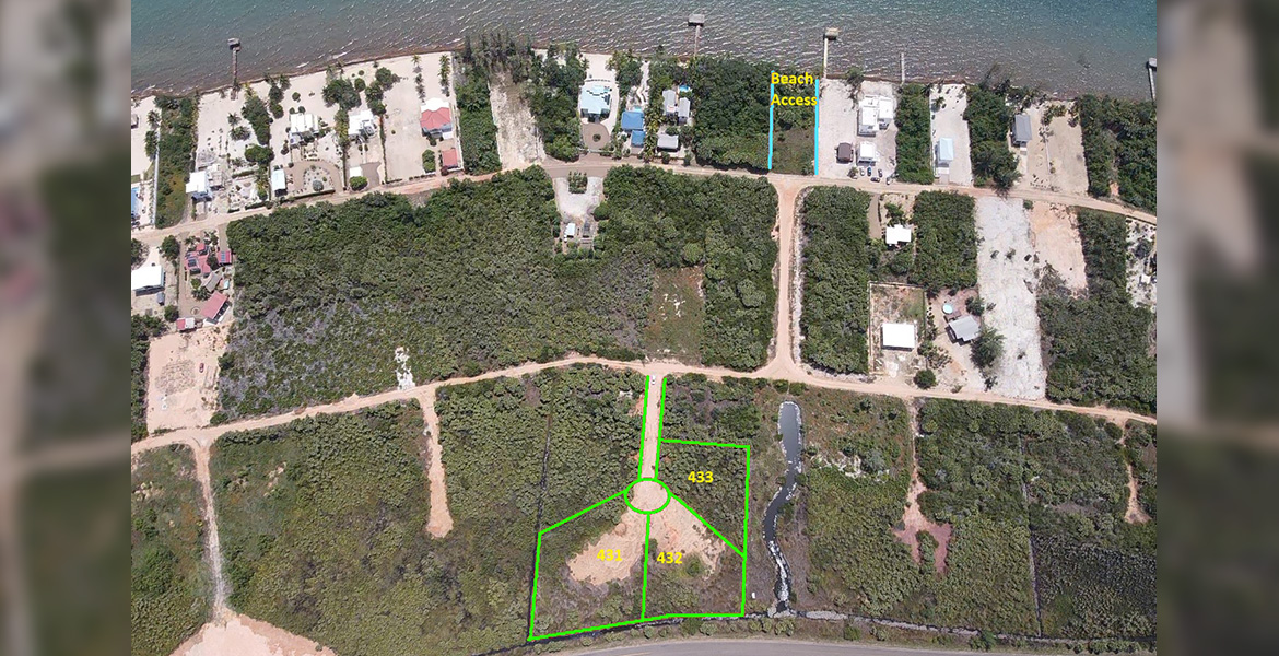Three beach access lots in Caribbean Way for sale