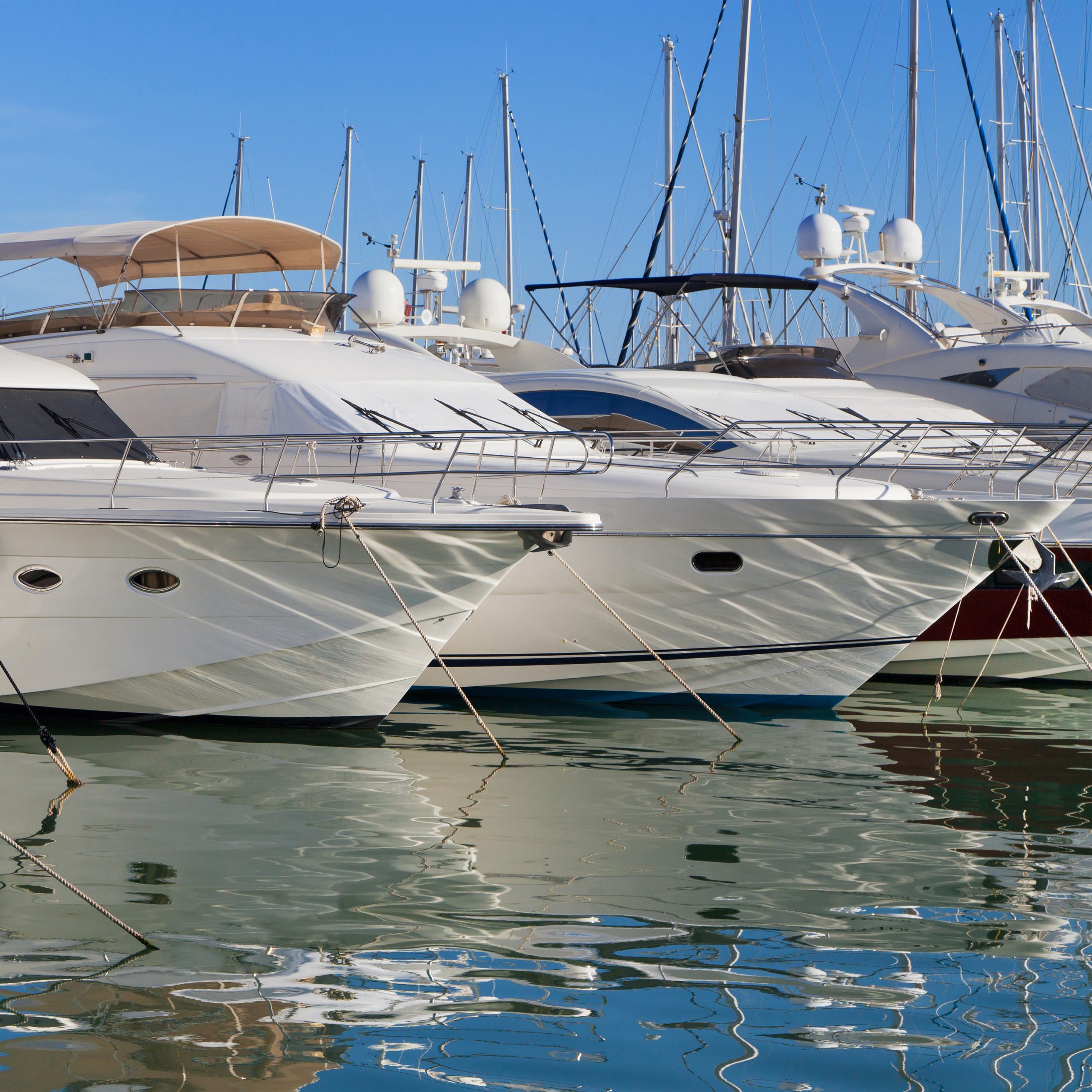 Yachts at Cambrils marina Belize waterfront real estate — the lagoon